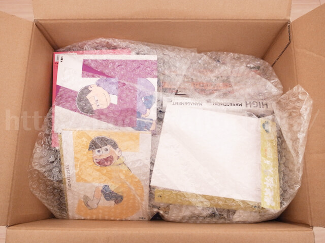 返送のダンボールを開封